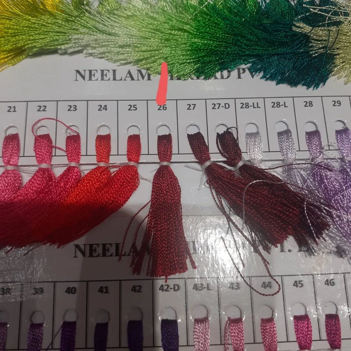 Choosing her shade on our thread card