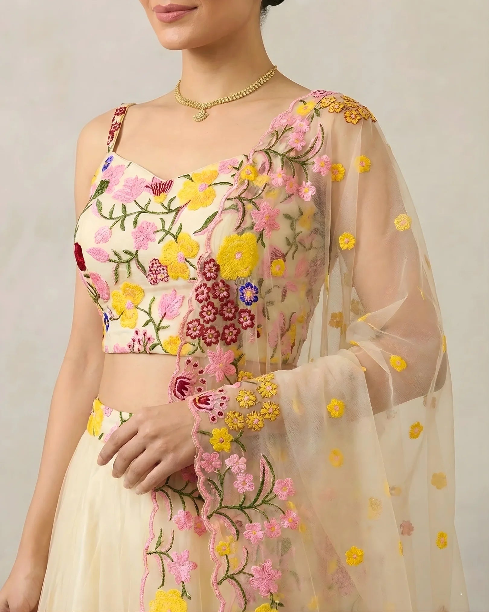 Cream Tulle-Net Multi-Thread-Embroidery Lehenga, Blouse & Dupatta Set.