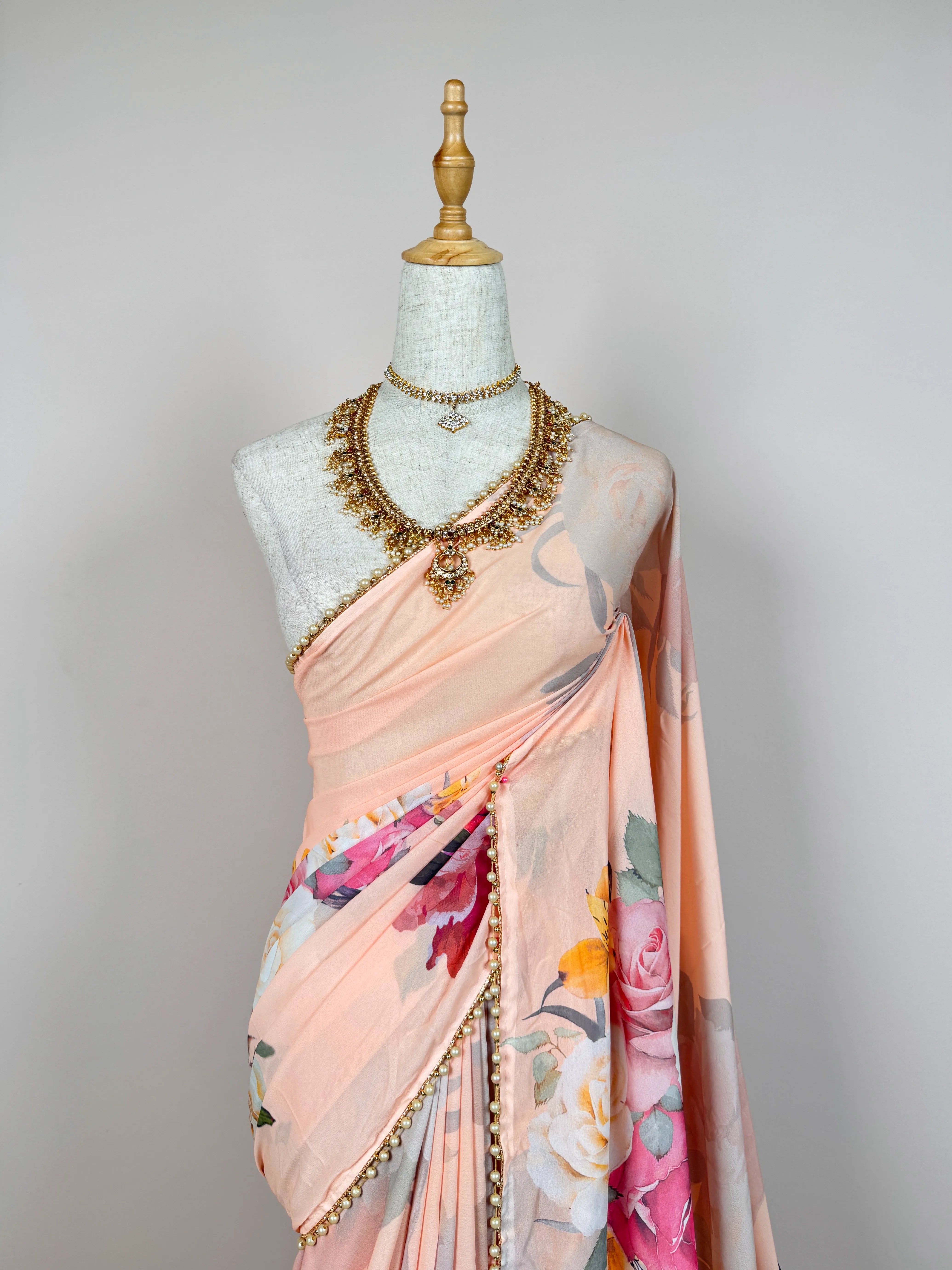 Sweet-Peach Georgette Floral-Theme Pearl-Border North-Saree